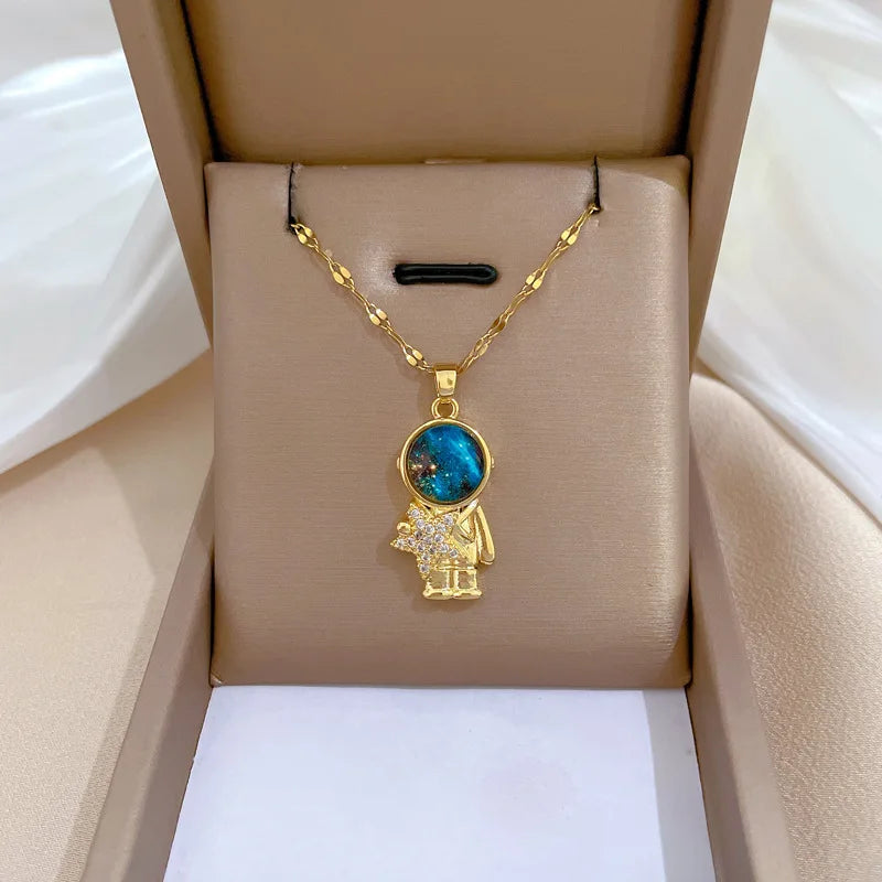 🌟 Light Luxury Astronaut Planet Necklace for Women | قلادة فاخرة بتصميم رائد فضاء وكواكب للنساء