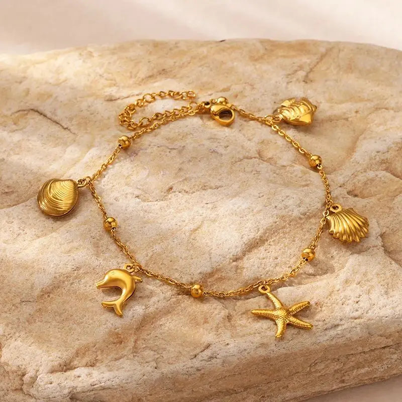✨ Ocean Animal Anklet – Gold Stainless Steel Beach Foot Jewelry 🔷 خلخال بسلسلة حيوانات البحر – ستانلس ستيل ذهبي لإطلالة صيفية أنيقة للنساء
