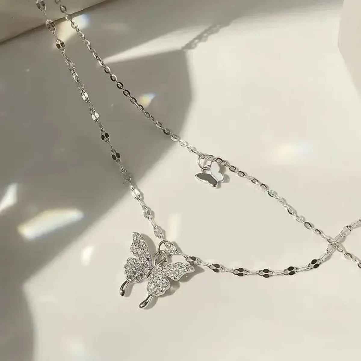 💎 Women’s Double Layer Butterfly Necklace 🦋 – Sparkling Exquisite Collar Chain Jewelry for Party & Holiday Gift | عقد نسائي مزدوج الطبقات بتصميم فراشة لامع – سلسلة أنيقة للحفلات والهدايا