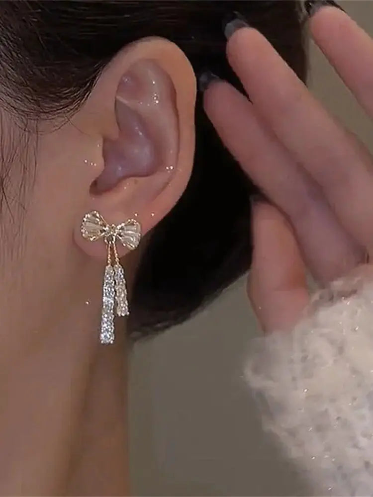 ✨ Fashion Zircon Bow Tassel Earrings 🎀 | أقراط نسائية أنيقة بشكل فيونكة مرصعة بالزركون والكريستال – إكسسوار راقٍ للحفلات والهدايا