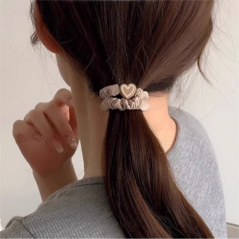 10-Piece High Elastic Leather Hair Bands – Durable Ponytail Holders for Women | طقم 10 رباط شعر جلدية مطاطية – لحمل ذيل الحصان بثبات وأناقة للنساء