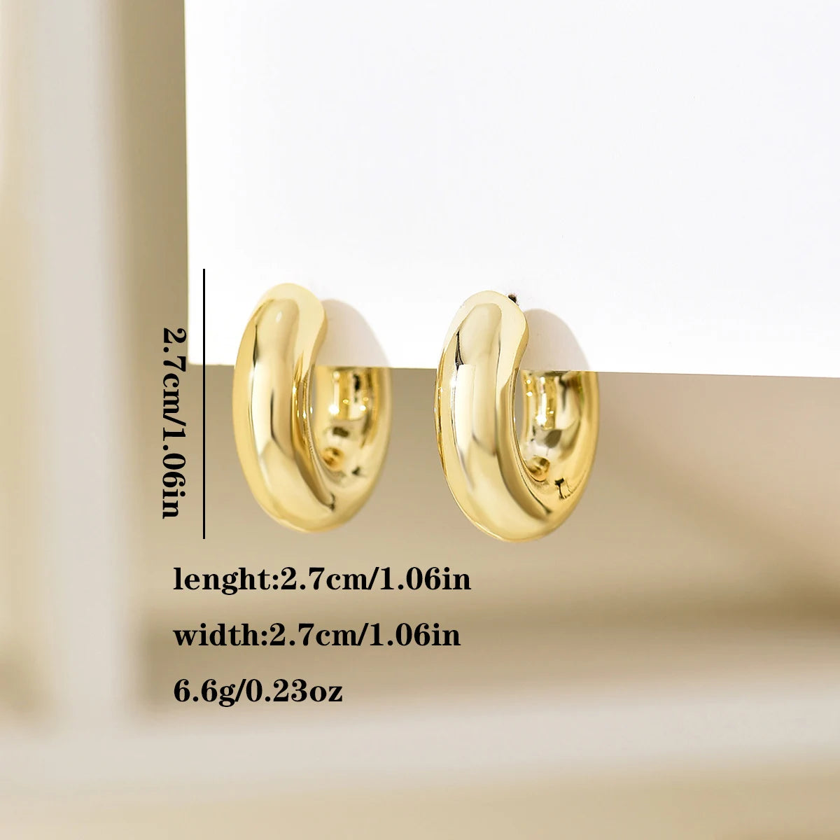 🌀 Trendy Circle Twist Hoop Earrings – Gold Tone | أقراط حلق دائرية ملتفة عصرية للنساء – لون ذهبي أنيق