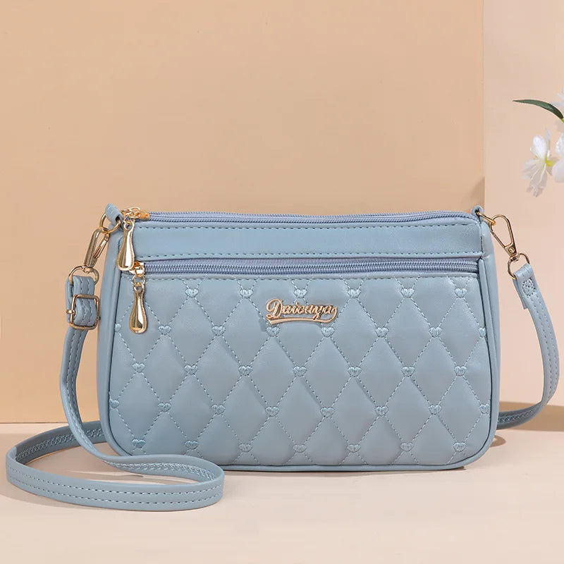 👜 Embroidery Messenger Bags Women Leather Handbags - حقيبة كتف نسائية مطرزة جلدية مع كُرة زينة أنيقة