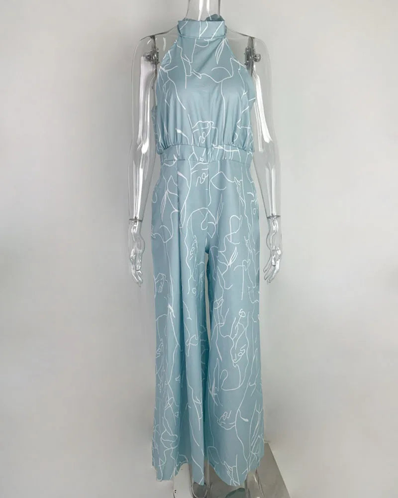 Summer Lace-Up Sleeveless Jumpsuit – Loose Fit with Geometric Print & Pockets | جمبسوت صيفي أنيق بدون أكمام برباط خصر ونقشة هندسية مع جيوب