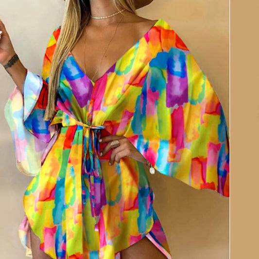 Sexy V-Neck Floral Boho Dress – Asymmetrical Loose Fit with Batwing Sleeves | فستان بوهيمي صيفي واسع بنقشة أوراق وياقة V وأكمام بات وينغ غير متماثل