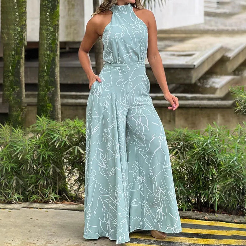 Summer Lace-Up Sleeveless Jumpsuit – Loose Fit with Geometric Print & Pockets | جمبسوت صيفي أنيق بدون أكمام برباط خصر ونقشة هندسية مع جيوب