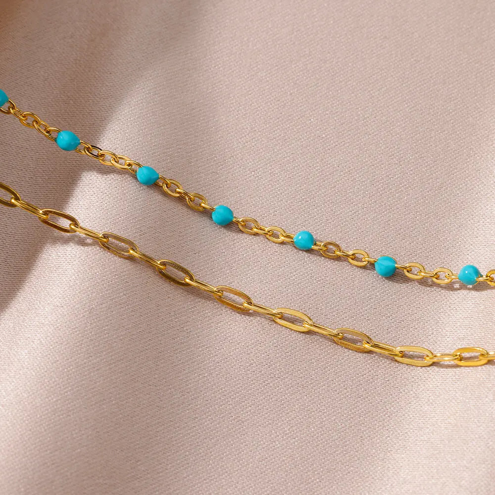 ✨ Double Layer Blue Beads Anklet – Gold Stainless Steel Foot Chain for Women 🔷 خلخال طبقتين مزين بحبيبات زرقاء – سلسلة كاحل من ستانلس ستيل ذهبي للنساء