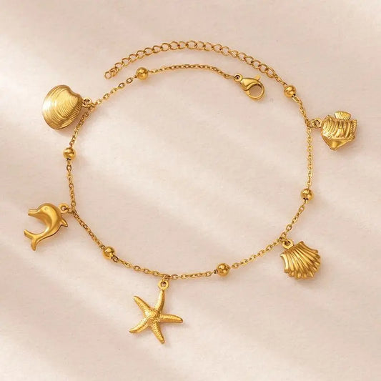 ✨ Ocean Animal Anklet – Gold Stainless Steel Beach Foot Jewelry 🔷 خلخال بسلسلة حيوانات البحر – ستانلس ستيل ذهبي لإطلالة صيفية أنيقة للنساء