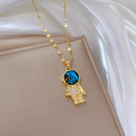 🌟 Light Luxury Astronaut Planet Necklace for Women | قلادة فاخرة بتصميم رائد فضاء وكواكب للنساء