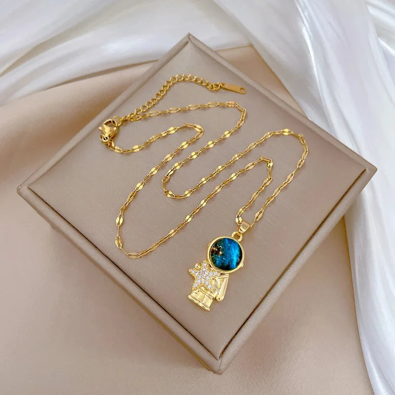🌟 Light Luxury Astronaut Planet Necklace for Women | قلادة فاخرة بتصميم رائد فضاء وكواكب للنساء
