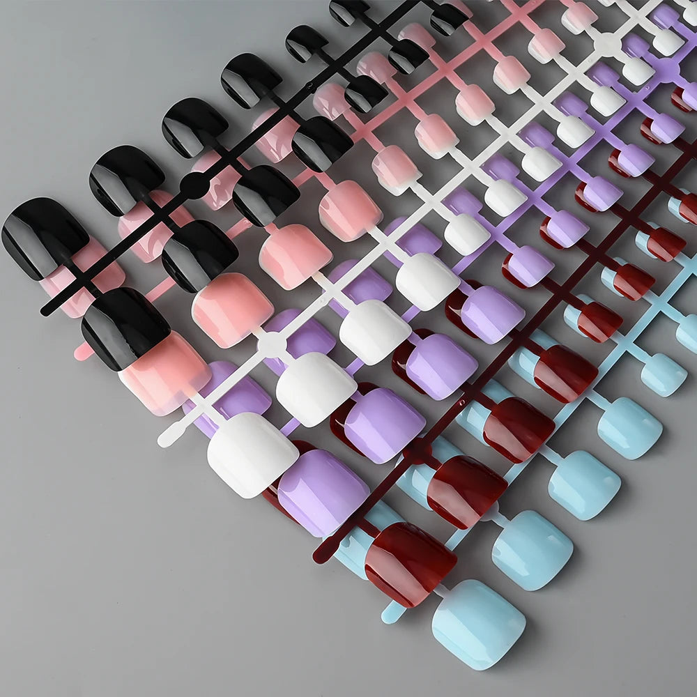 GlossyFit 144pcs Press-On Square Toenails – Full Coverage Glam in 4 Elegant Colors | غلام تو نيل – ١٤٤ ظفر صناعي قصير بتصميم مربع وألوان أنيقة