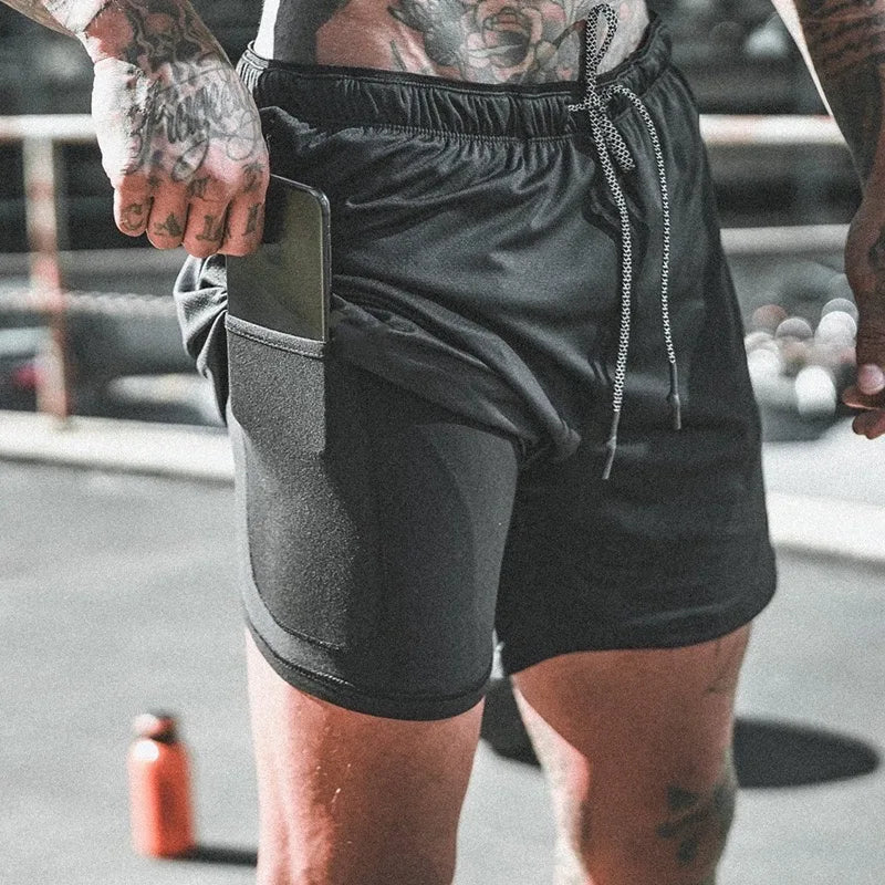 🩳 Men's Camouflage Mesh Running Shorts – Multi-Pocket Fitness & Beachwear | شورت رجالي رياضي بطبعة التمويه – شبكي وخفيف بجيوب متعددة للجيم والشاطئ