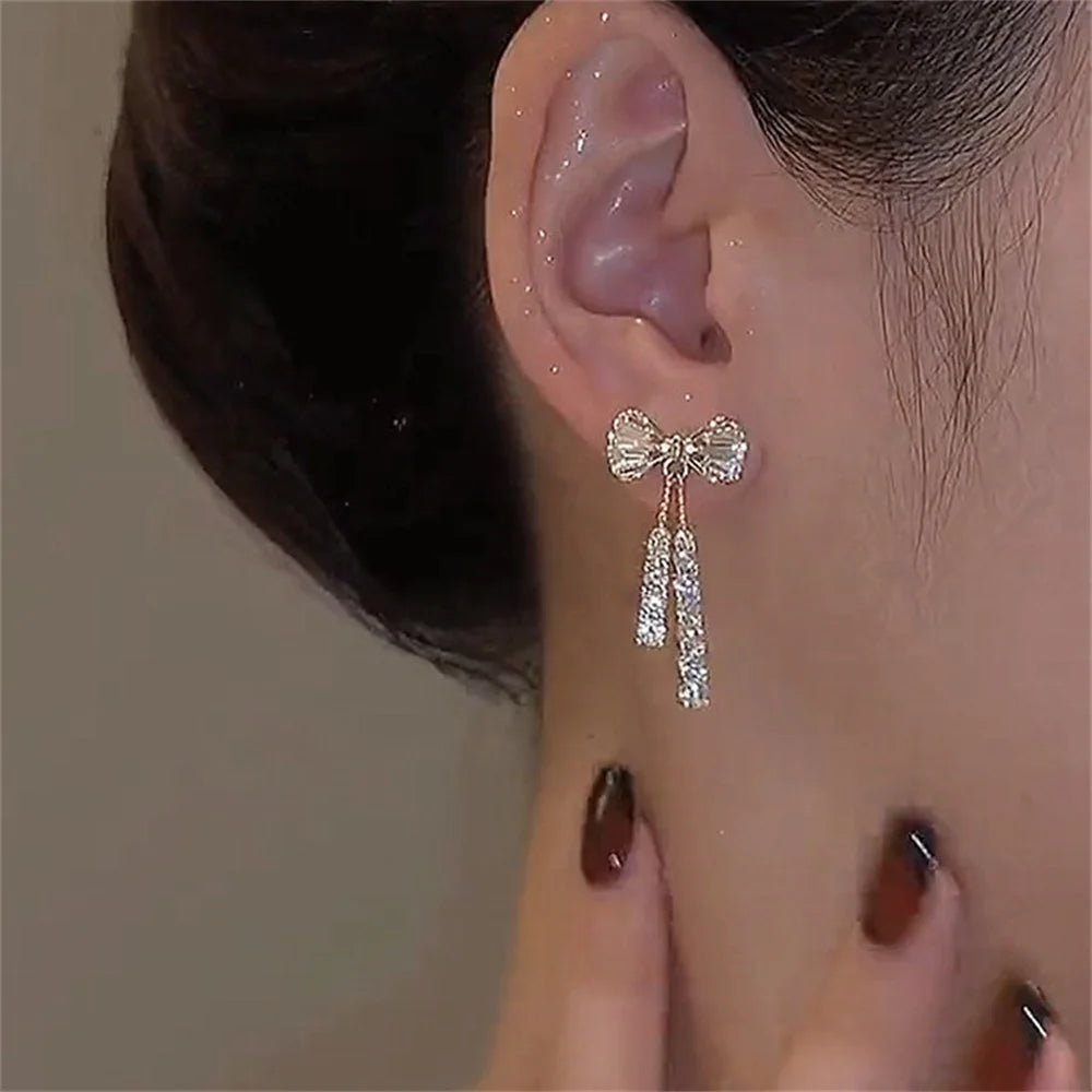 ✨ Fashion Zircon Bow Tassel Earrings 🎀 | أقراط نسائية أنيقة بشكل فيونكة مرصعة بالزركون والكريستال – إكسسوار راقٍ للحفلات والهدايا