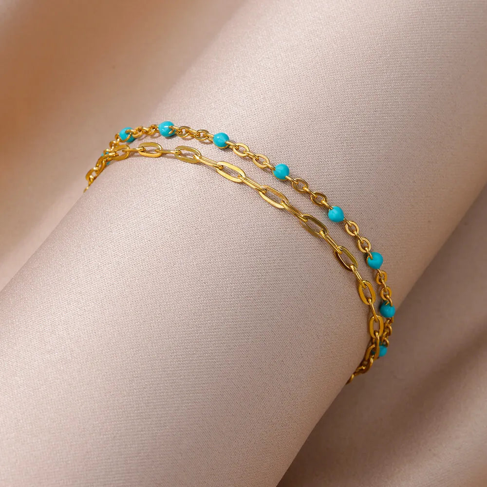 ✨ Double Layer Blue Beads Anklet – Gold Stainless Steel Foot Chain for Women 🔷 خلخال طبقتين مزين بحبيبات زرقاء – سلسلة كاحل من ستانلس ستيل ذهبي للنساء