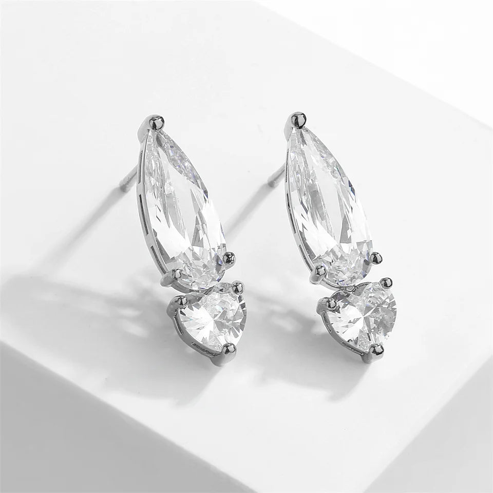 ZAKOL Pear Cut Solitaire White Zircon Mini Stud Earrings Exquisite Crystal Water Drop CZ Earring Jewelry Gift for Women Girls