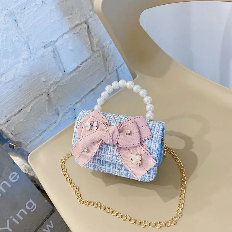 Princess Chanel style chain bag baby pearl accessories hand bell bag trendy children cute bow girl shoulder bag