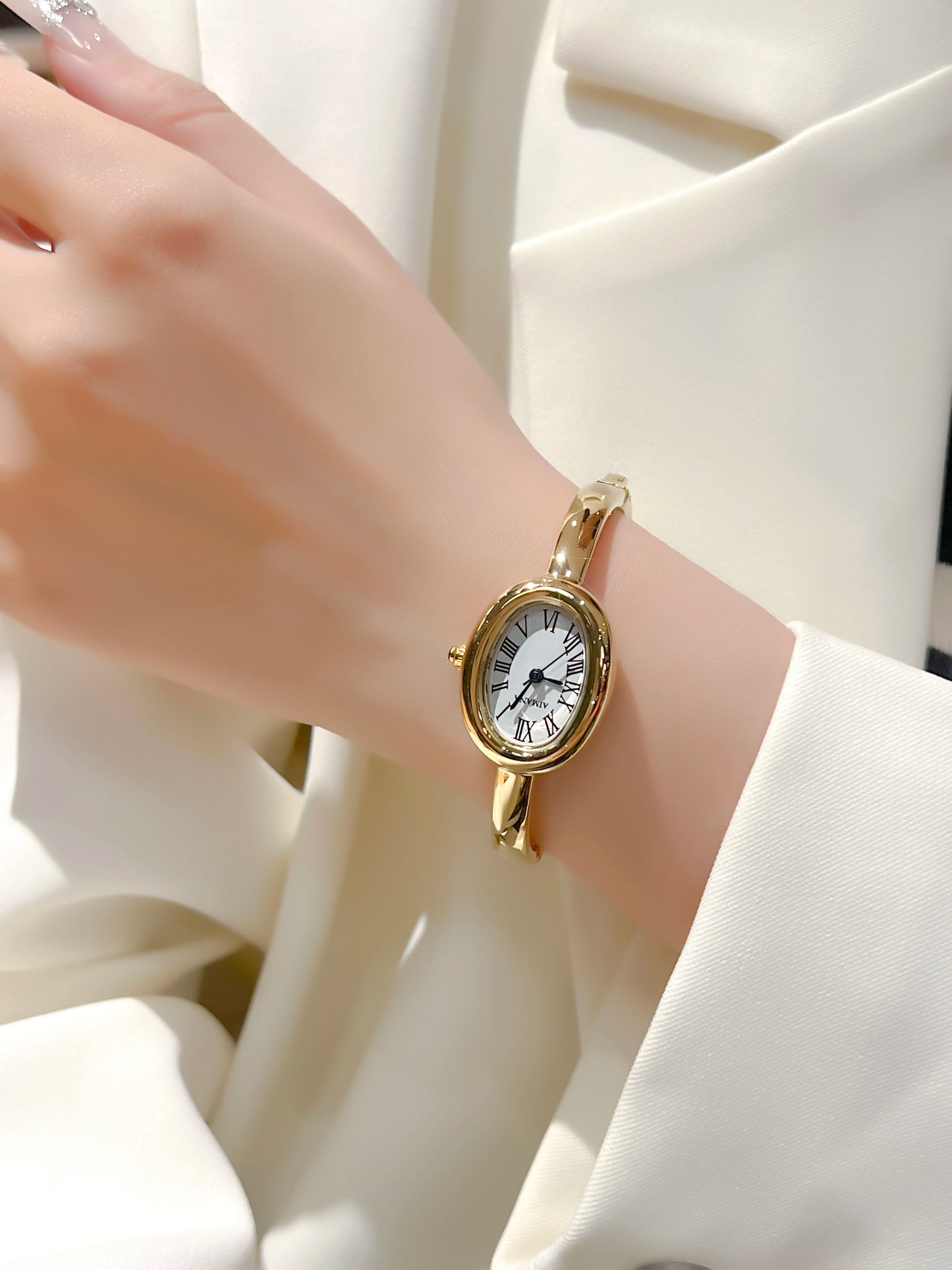 Gold Oval Women’s Watch – Roman Numeral Dial