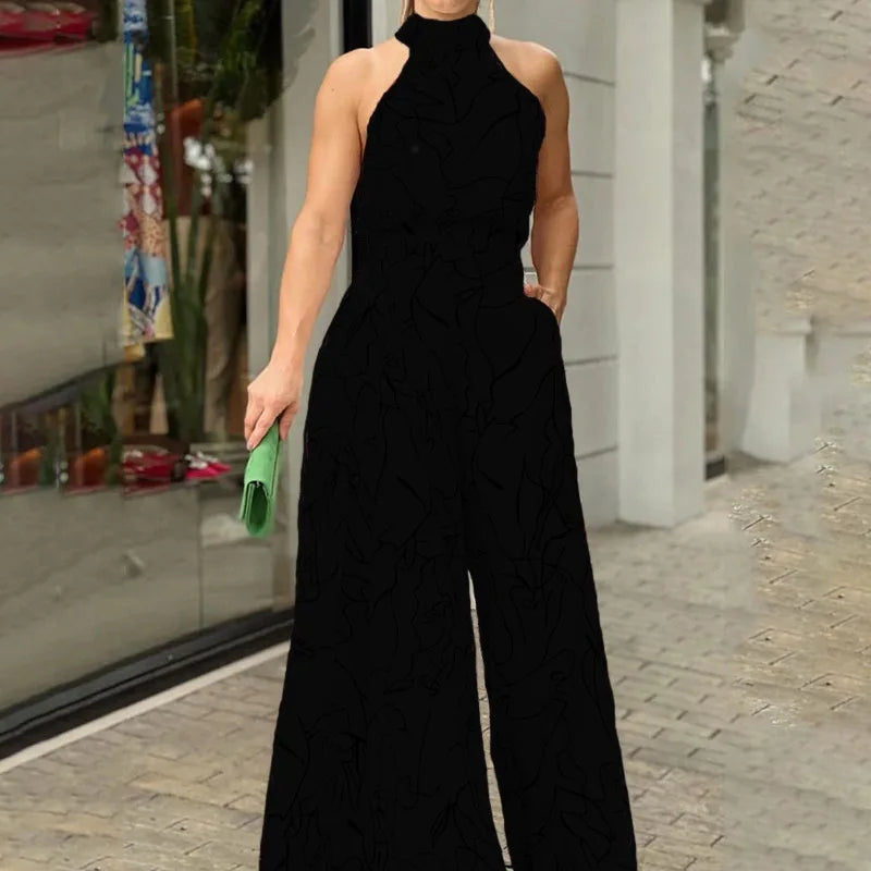 Summer Lace-Up Sleeveless Jumpsuit – Loose Fit with Geometric Print & Pockets | جمبسوت صيفي أنيق بدون أكمام برباط خصر ونقشة هندسية مع جيوب