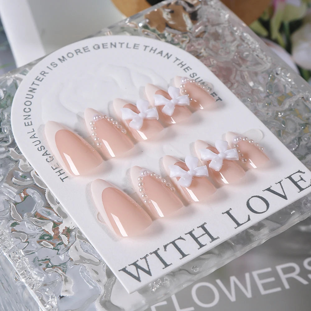 24Pcs Pearl Bow Press On Nails White Bowknot French Almond Fasle Nails Wearable Full Cover Fake Nails Tip for Girls Women