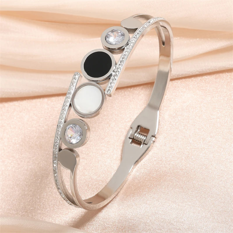 ZAKOL Fashion Black Shell Roman Numeral Titanium Steel Bangle Hollow Circle Button Bracelet Jewelry Gifts for Women