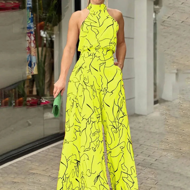Summer Lace-Up Sleeveless Jumpsuit – Loose Fit with Geometric Print & Pockets | جمبسوت صيفي أنيق بدون أكمام برباط خصر ونقشة هندسية مع جيوب