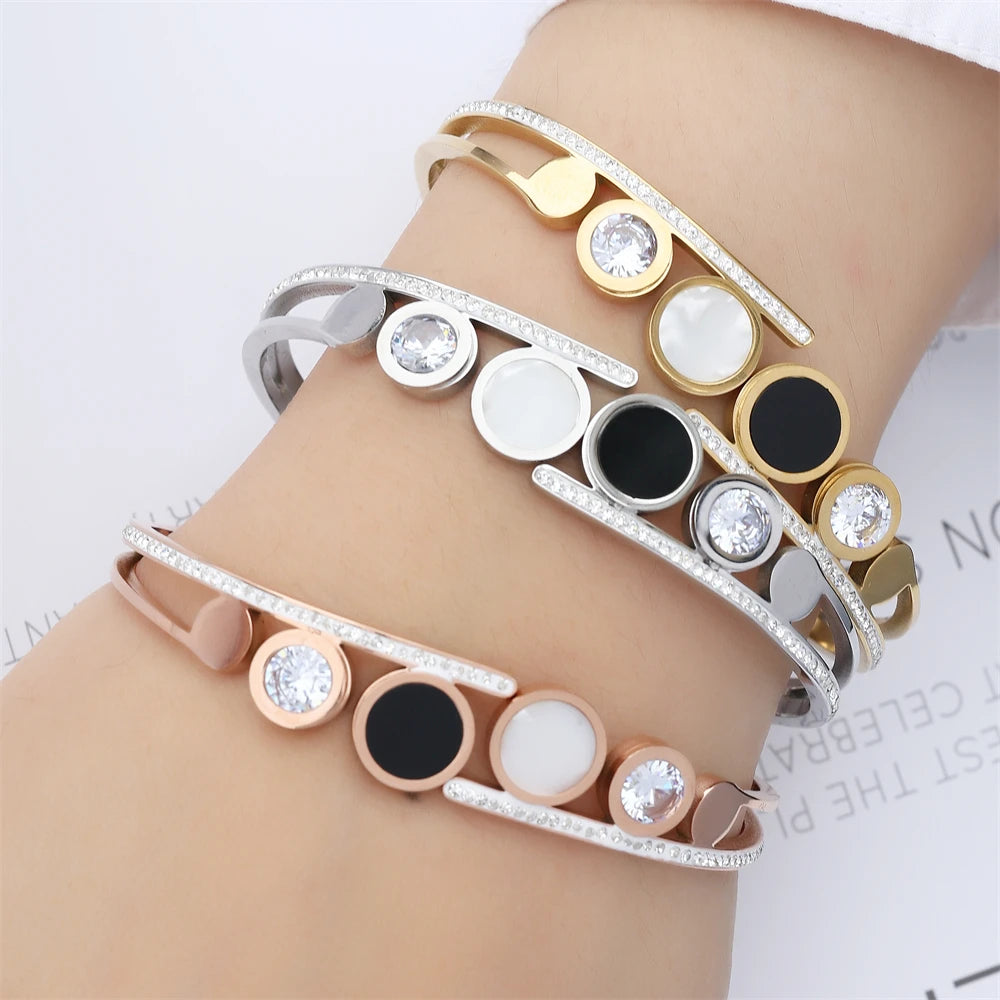 ZAKOL Fashion Black Shell Roman Numeral Titanium Steel Bangle Hollow Circle Button Bracelet Jewelry Gifts for Women
