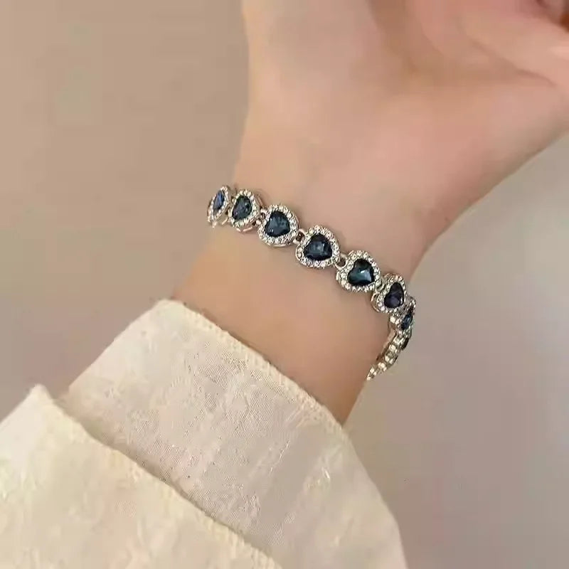 سوار زاكول بسلسلة من أحجار الراين على شكل قلب أزرق لامع للنساء والفتيات، بلون فضي، مجوهرات كريستال أنيقة وعصرية، هدية