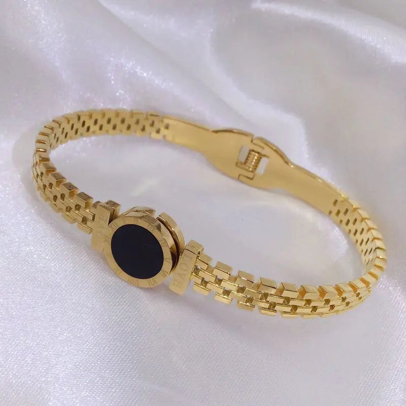 ZAKOL Fashion Black Shell Roman Numeral Titanium Steel Bangle Hollow Circle Button Bracelet Jewelry Gifts for Women