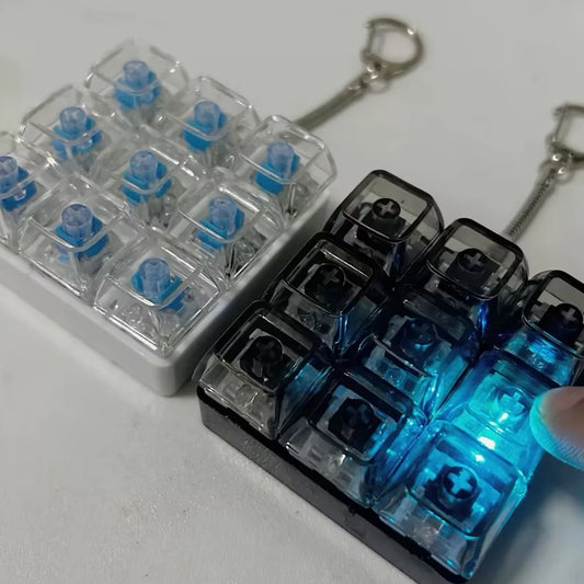 زَكول لوحة مفاتيح ألعاب فِيدجيت LED غطاء مفتاح كريستالي سلسلة مفاتيح تخفيف التوتر أداة للأصابع ألعاب تفريغ الضغط لعبة فِيدجيت نقّارة
