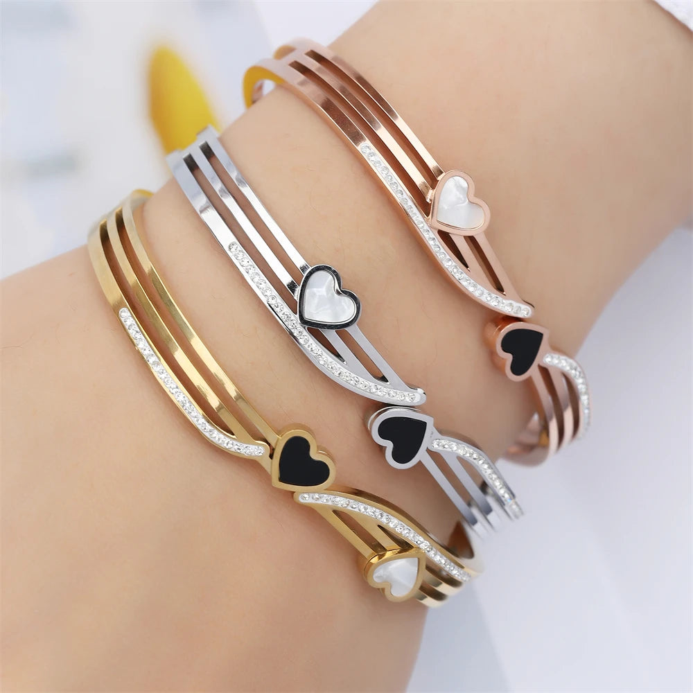 ZAKOL Fashion Black Shell Roman Numeral Titanium Steel Bangle Hollow Circle Button Bracelet Jewelry Gifts for Women