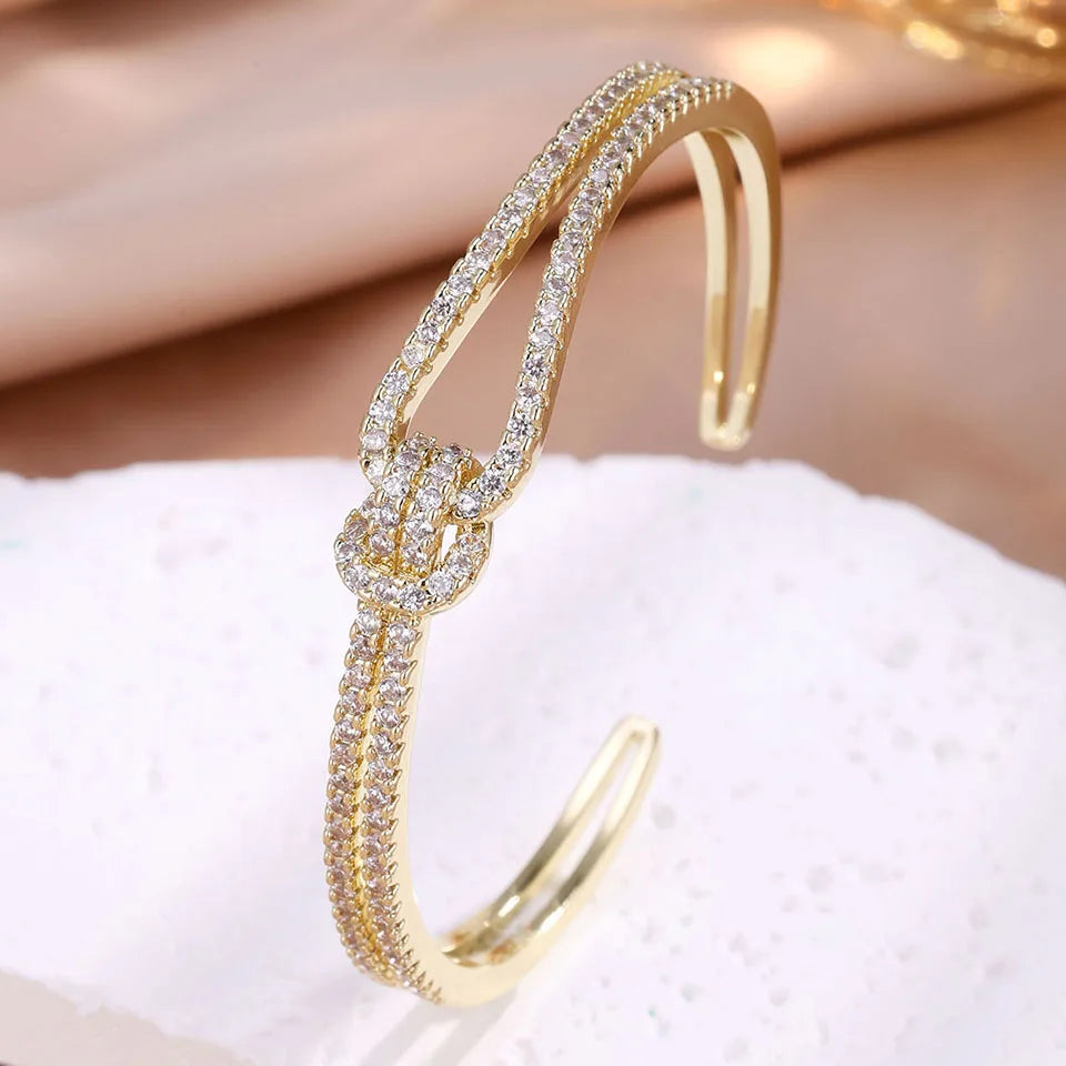 ZAKOL Exquisite Dazzling Full Cubic Zirconia Knot Bracelet Bangles for Women Fashion Adjustable Open Bracelet Jewelry Gift