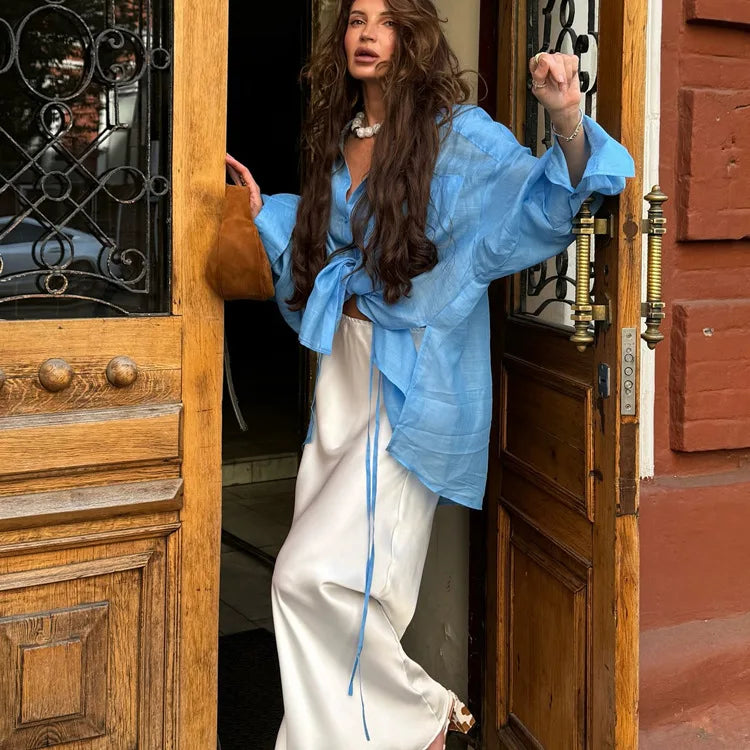 Casual Loose Solid See Through Blue Blouse For Women Sexy Lapel Long Sleeve Classic Shirt 2026 New Autumn Commuter Female Tops