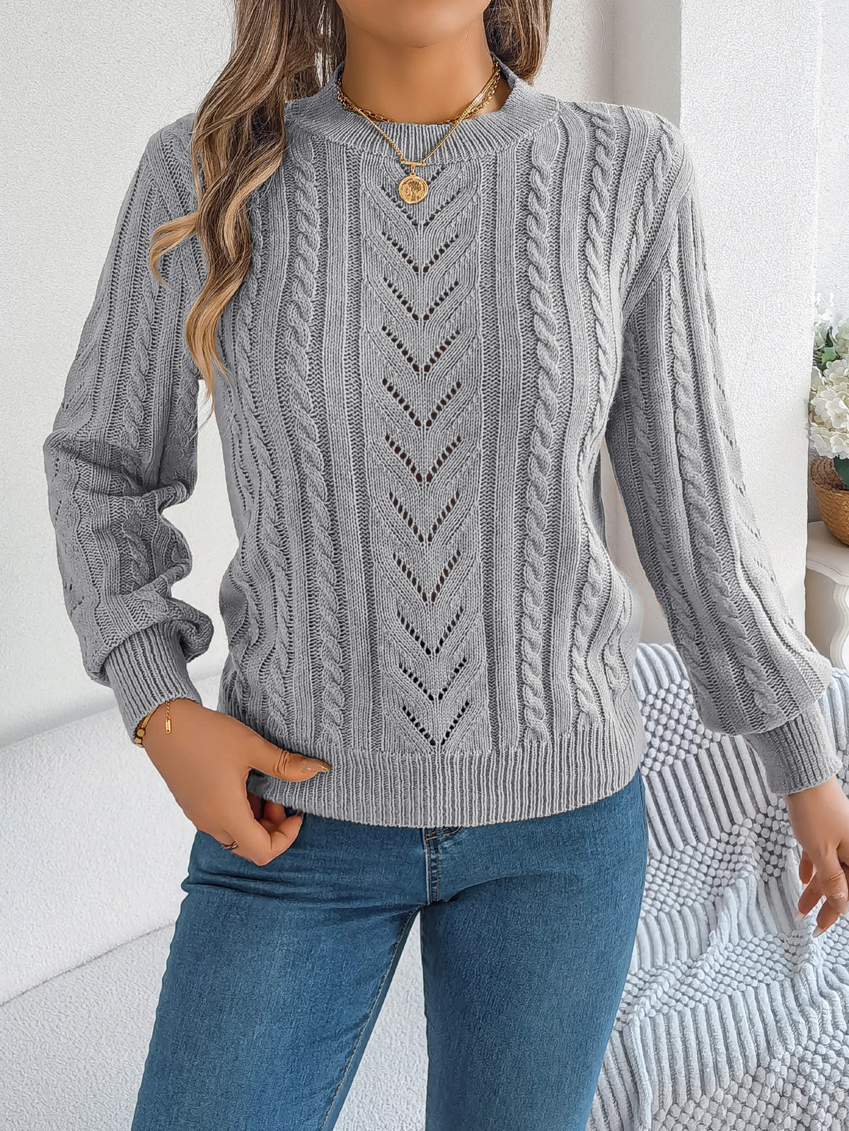 Autumn and Winter Casual Solid Color O-Neck Hollow Out Long Sleeved Pullover Sweater