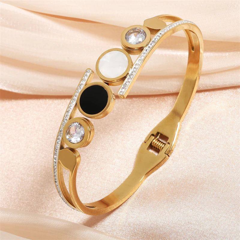 ZAKOL Fashion Black Shell Roman Numeral Titanium Steel Bangle Hollow Circle Button Bracelet Jewelry Gifts for Women