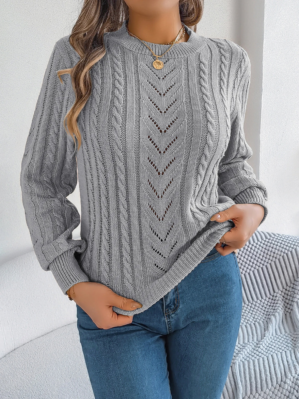 Autumn and Winter Casual Solid Color O-Neck Hollow Out Long Sleeved Pullover Sweater