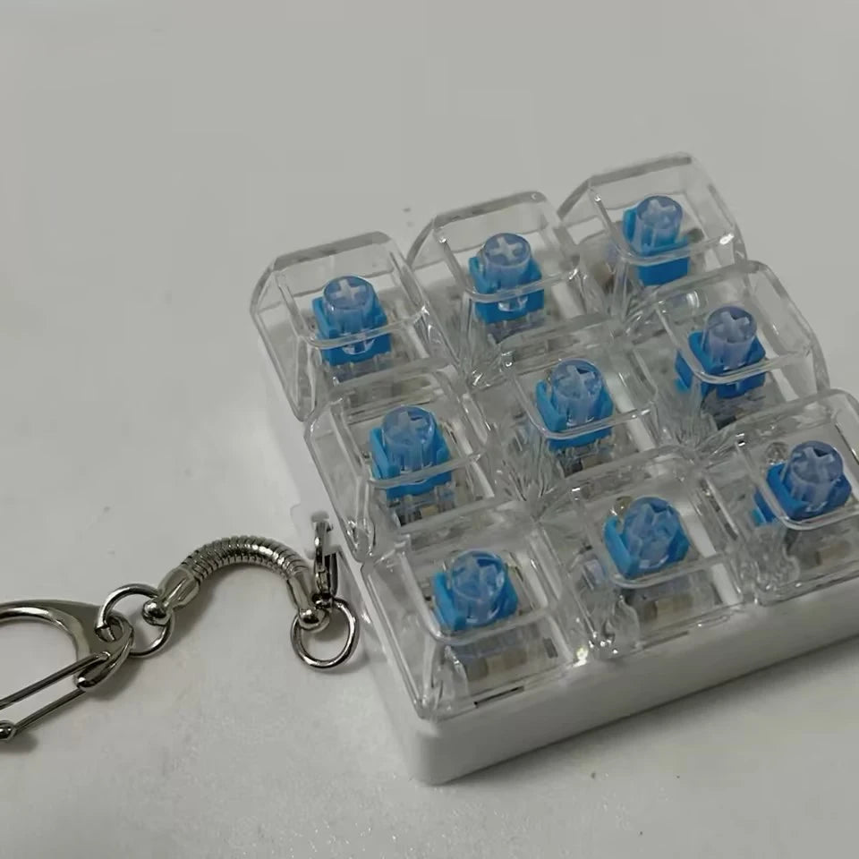 زَكول لوحة مفاتيح ألعاب فِيدجيت LED غطاء مفتاح كريستالي سلسلة مفاتيح تخفيف التوتر أداة للأصابع ألعاب تفريغ الضغط لعبة فِيدجيت نقّارة