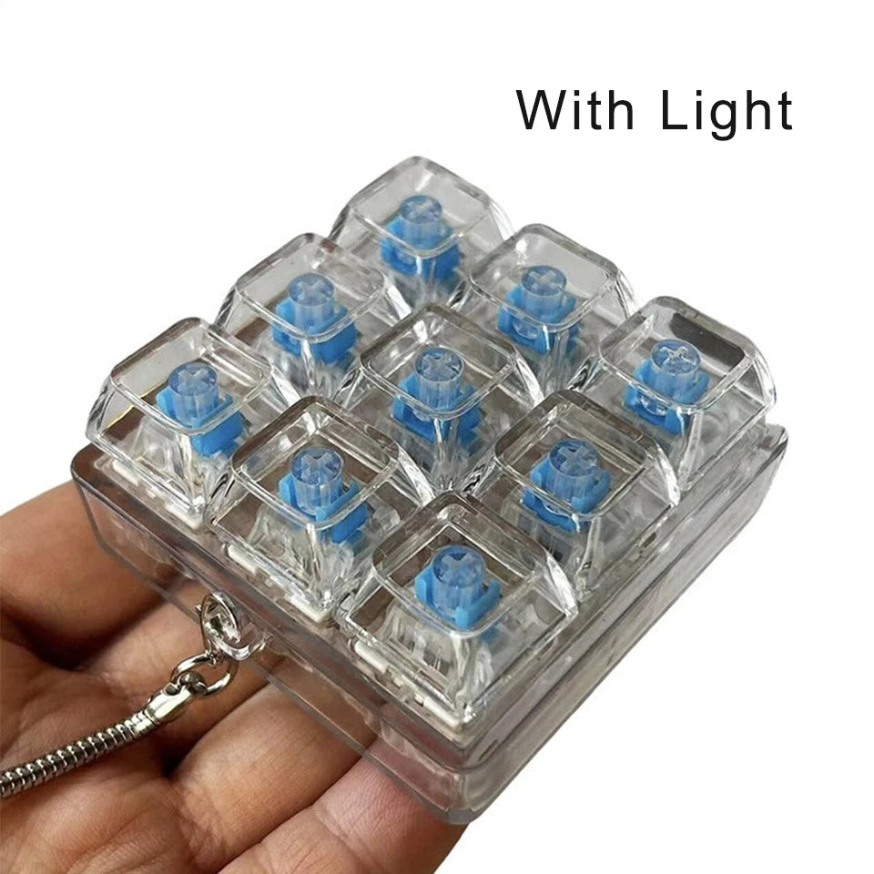 زَكول لوحة مفاتيح ألعاب فِيدجيت LED غطاء مفتاح كريستالي سلسلة مفاتيح تخفيف التوتر أداة للأصابع ألعاب تفريغ الضغط لعبة فِيدجيت نقّارة