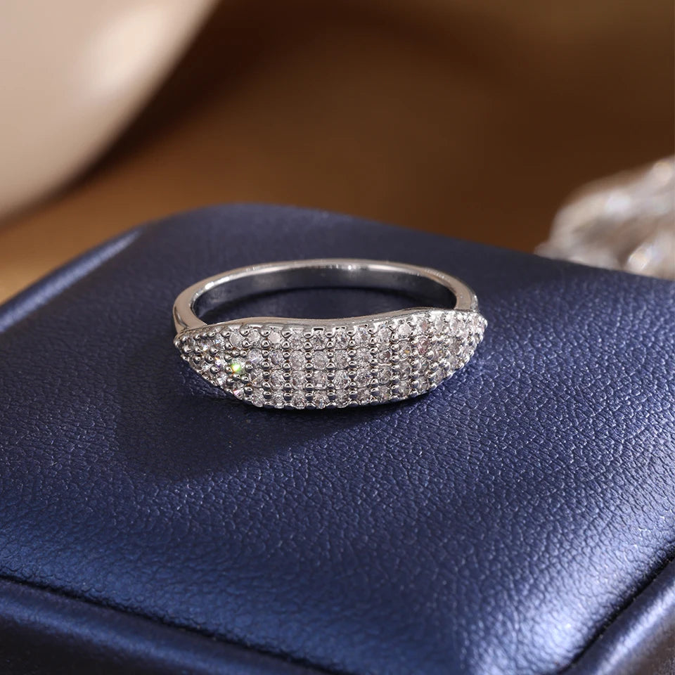 ZAKOL New Trendy Shiny Micro Pave Zircon Finger Ring White  Crystal CZ Minimalist Aesthetic Ring for Women Wholesale