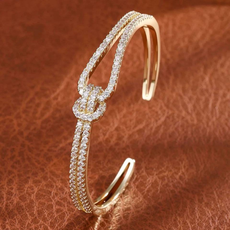 ZAKOL Exquisite Dazzling Full Cubic Zirconia Knot Bracelet Bangles for Women Fashion Adjustable Open Bracelet Jewelry Gift