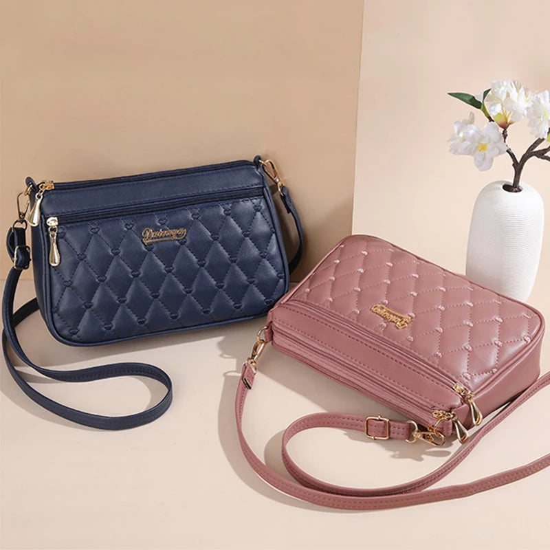 👜 Embroidery Messenger Bags Women Leather Handbags - حقيبة كتف نسائية مطرزة جلدية مع كُرة زينة أنيقة