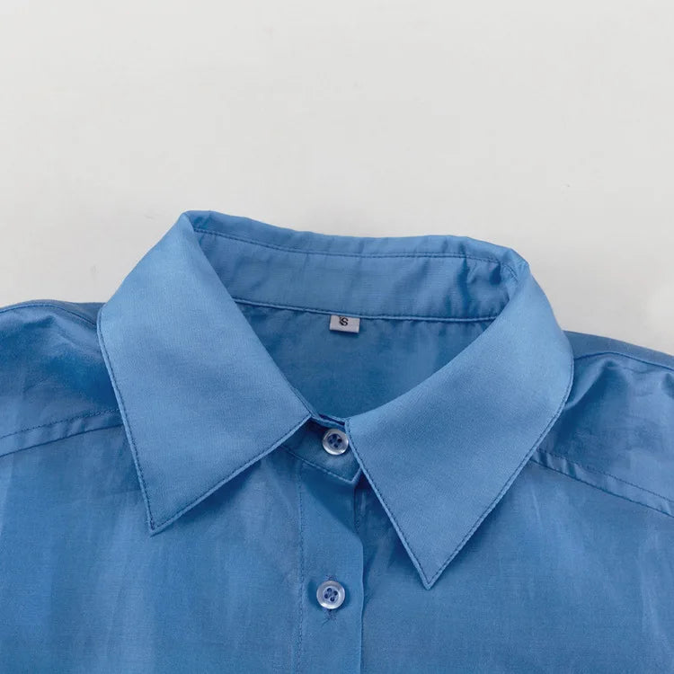 Casual Loose Solid See Through Blue Blouse For Women Sexy Lapel Long Sleeve Classic Shirt 2026 New Autumn Commuter Female Tops