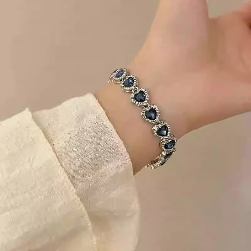 سوار زاكول بسلسلة من أحجار الراين على شكل قلب أزرق لامع للنساء والفتيات، بلون فضي، مجوهرات كريستال أنيقة وعصرية، هدية