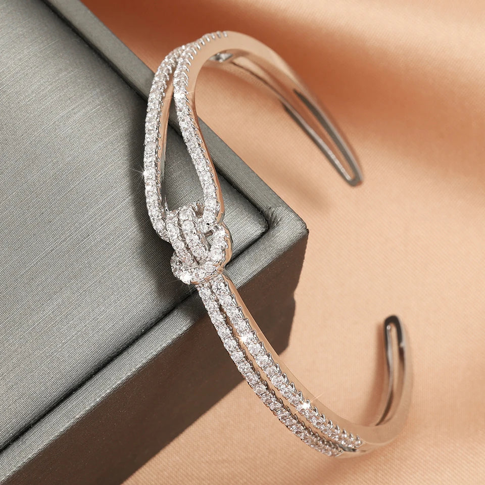 ZAKOL Exquisite Dazzling Full Cubic Zirconia Knot Bracelet Bangles for Women Fashion Adjustable Open Bracelet Jewelry Gift