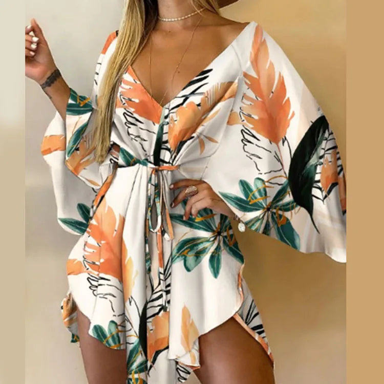 Sexy V-Neck Floral Boho Dress – Asymmetrical Loose Fit with Batwing Sleeves | فستان بوهيمي صيفي واسع بنقشة أوراق وياقة V وأكمام بات وينغ غير متماثل