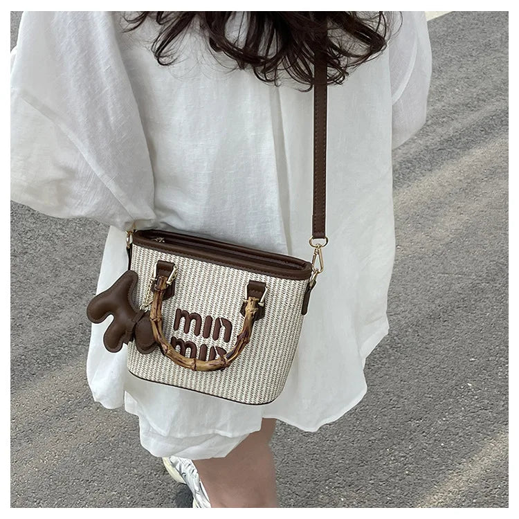 2025 New Spring Fashion Contrasting Straw Bamboo Joints Basket Bag Bucket Bag Hand-held Shoulder Diagonal Bag