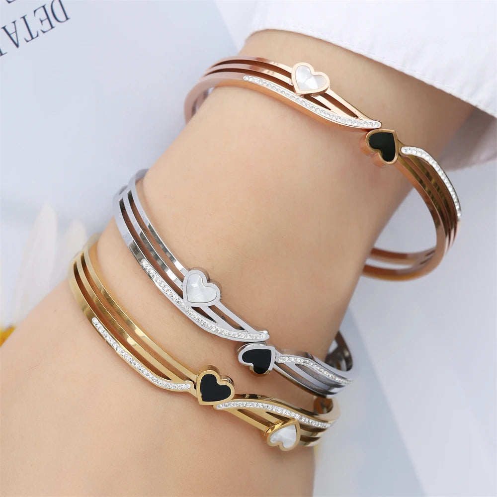 ZAKOL Fashion Black Shell Roman Numeral Titanium Steel Bangle Hollow Circle Button Bracelet Jewelry Gifts for Women