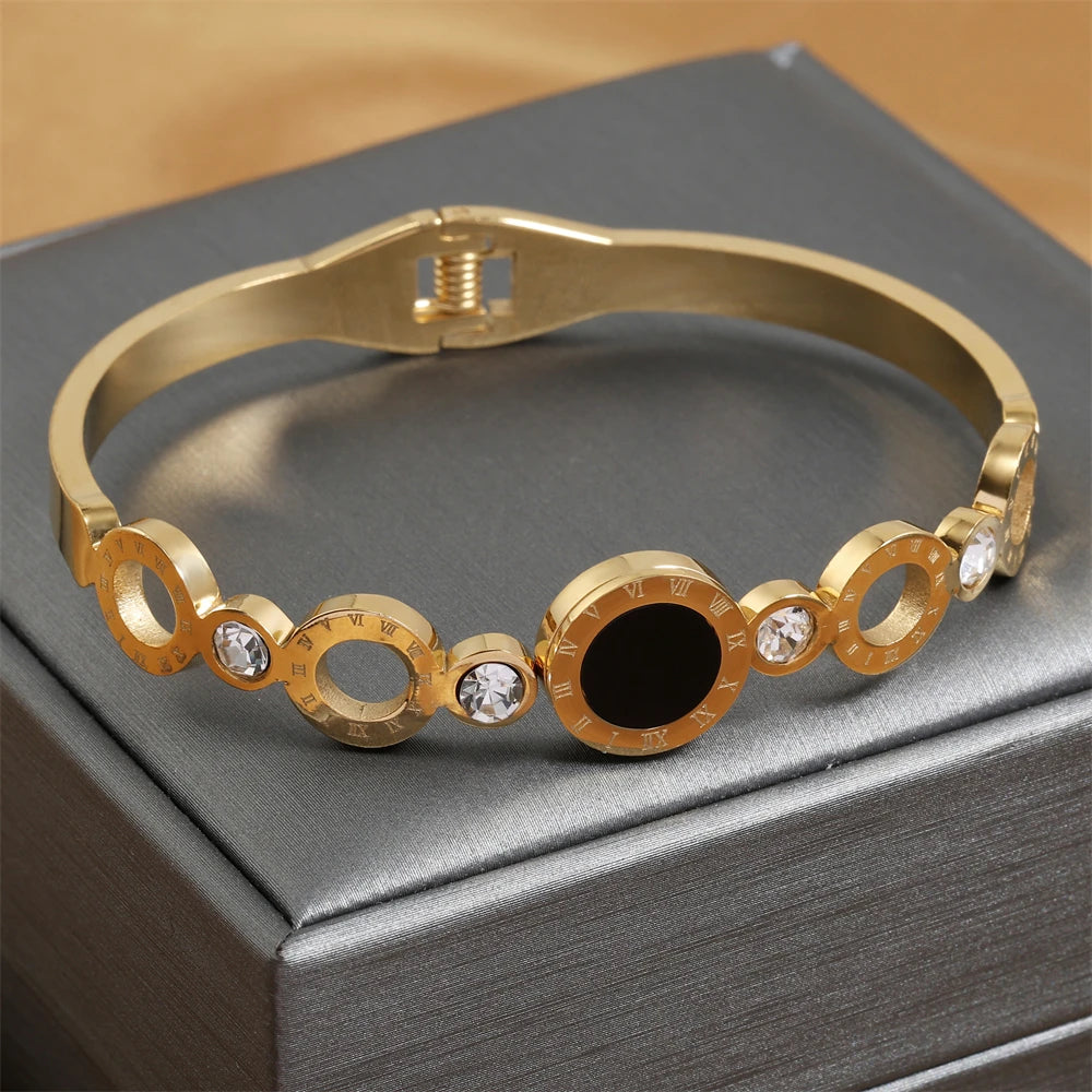 ZAKOL Fashion Black Shell Roman Numeral Titanium Steel Bangle Hollow Circle Button Bracelet Jewelry Gifts for Women
