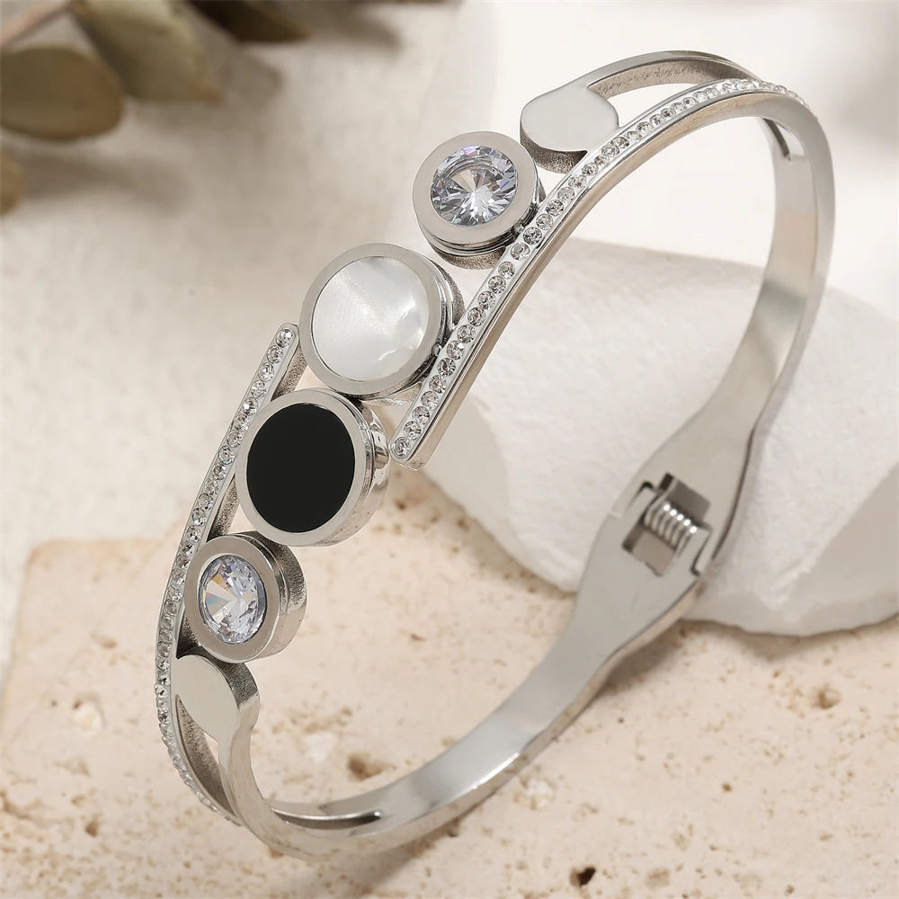 ZAKOL Fashion Black Shell Roman Numeral Titanium Steel Bangle Hollow Circle Button Bracelet Jewelry Gifts for Women