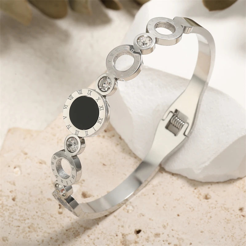 ZAKOL Fashion Black Shell Roman Numeral Titanium Steel Bangle Hollow Circle Button Bracelet Jewelry Gifts for Women
