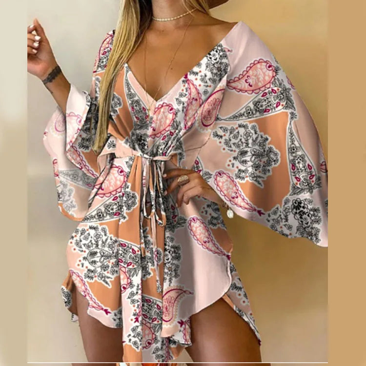 Sexy V-Neck Floral Boho Dress – Asymmetrical Loose Fit with Batwing Sleeves | فستان بوهيمي صيفي واسع بنقشة أوراق وياقة V وأكمام بات وينغ غير متماثل